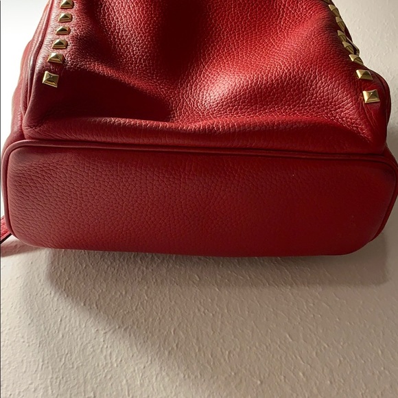 Michael Kors red backpack with studs